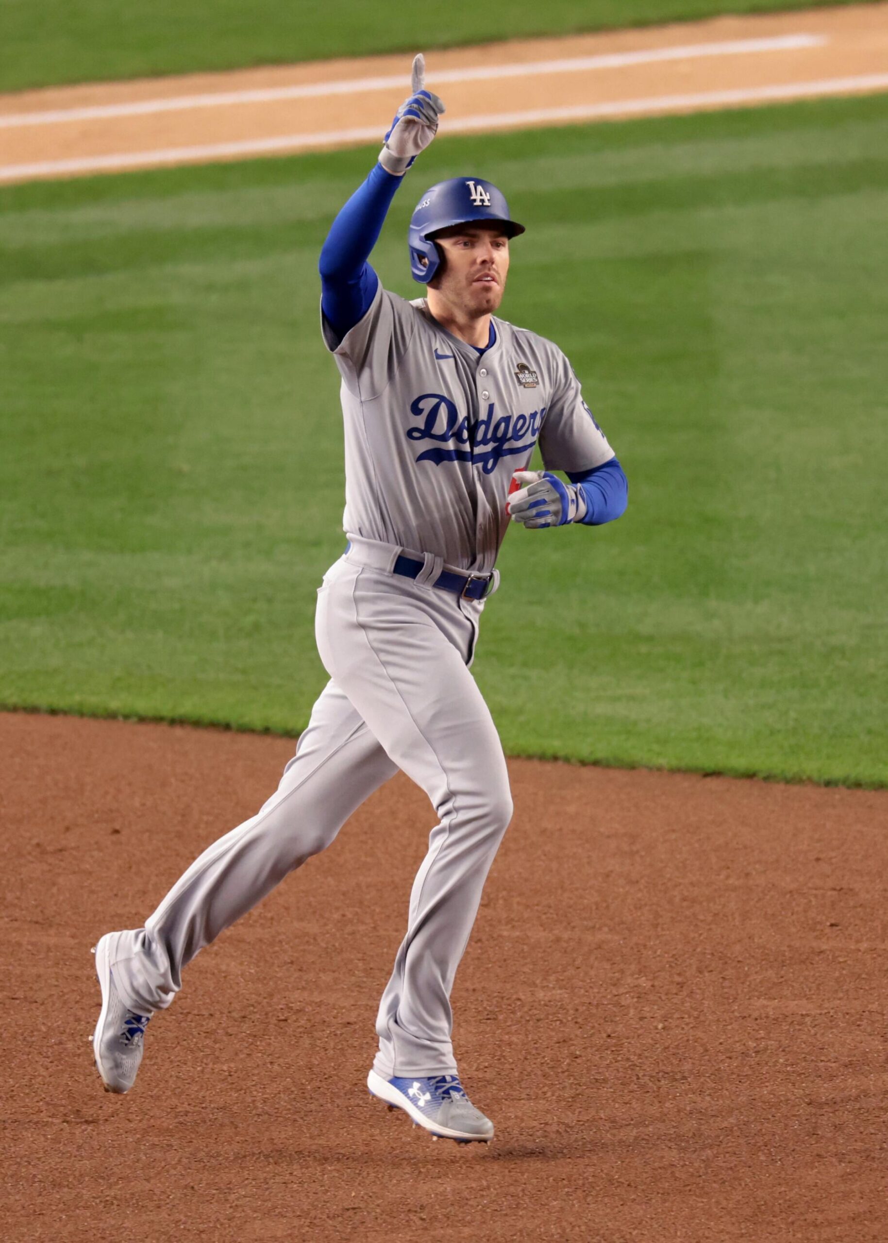 Freddie Freeman rounds the bases after hitting a two-run home run in the first inning of Game 3 of the World Series.