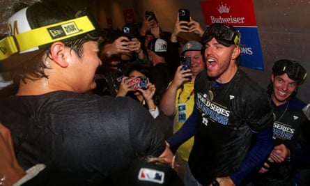 Shohei Ohtani and Freddie Freeman celebrate their team’s victory in Game 5 to clinch the championship