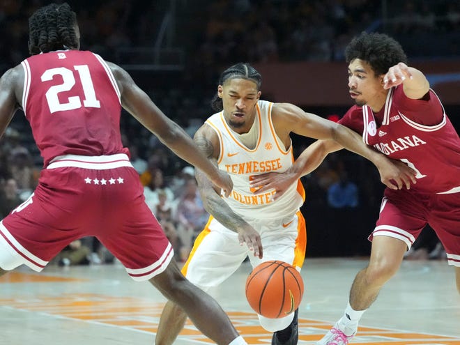 Tennessee guard Zakai Zeigler (5) tries to get past Indiana guard Myles Rice (1) and forward Mackenzie Mgbako (21) during an NCAA college basketball game on Sunday, October 27, 2024, in Knoxville. Tenn.