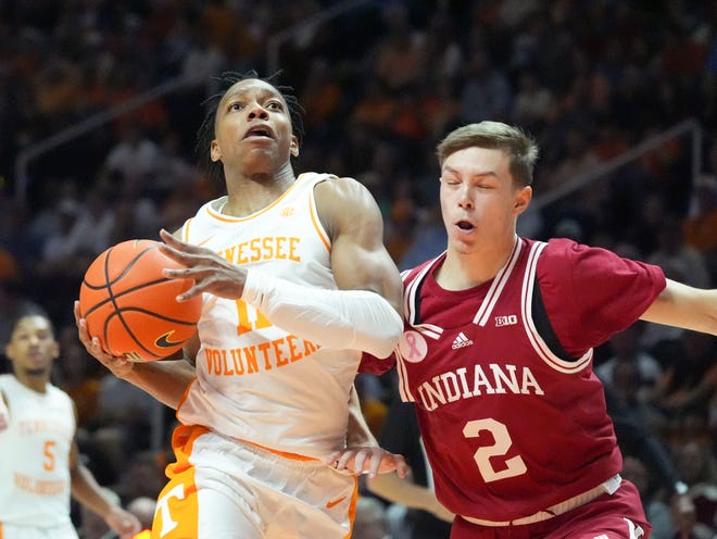 Tennessee guard Jordan Gainey (11) tries to get to the basket while guarded by Indiana guard Gabe Cupps (2) during an NCAA college basketball game on Sunday, October 27, 2024, in Knoxville. Tenn.