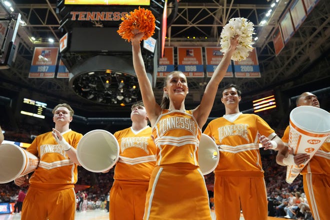 Tennessee cheerleaders keeps fans cheering during a college basketball exhibition game between Tennessee and Indiana on Sunday, October 27, 2024, in Knoxville. Tenn.