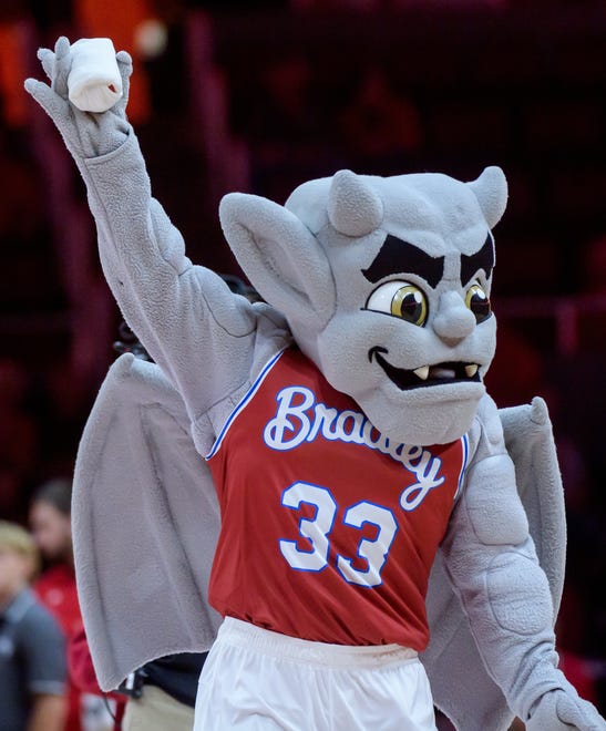 Bradley University mascot Kaboom! holds up a T-shirt to throw to the crowd in the first half of a college basketball exhibition game Wednesday, Oct. 30, 2024 at the Peoria Civic Center. The Braves defeated the Millikin Big Blue 80-63.