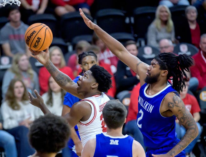 Bradley's Jaquan Johnson moves to the basket against Millikin's Tionne Spates in the second half of their college basketball exhibition game Wednesday, Oct. 30, 2024 at the Peoria Civic Center. The Braves defeated the Big Blue 80-63.
