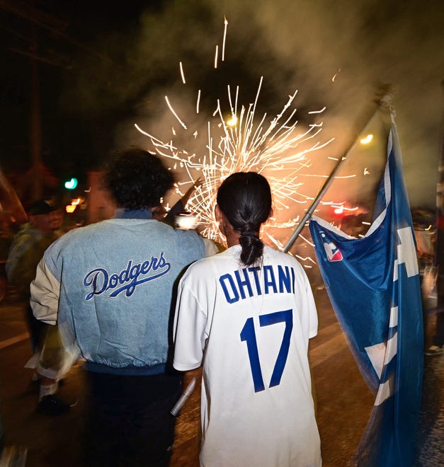 Los Angeles Dodgers fans celebrate winning the World Series in Los Angeles.