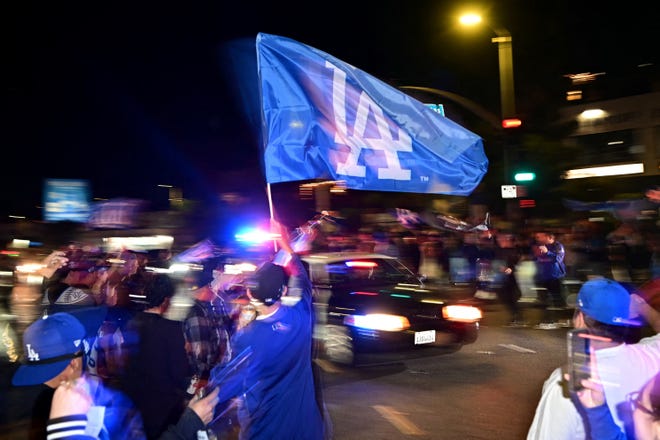 Los Angeles Dodgers fans celebrate winning the World Series.