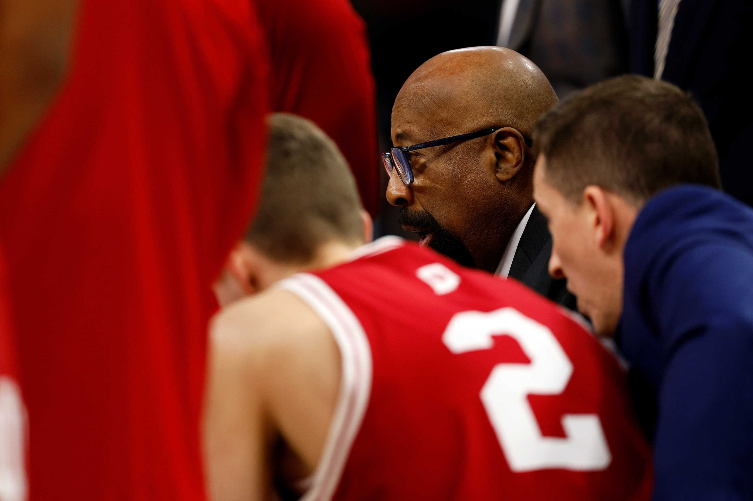 MINNEAPOLIS, MINNESOTA - MARCH 15: Head coach Mike Woodson of the Indiana Hoosiers huddles with his team during a timeout against the Nebraska Cornhuskers in the second half at Target Center in the Quarterfinals of the Big Ten Tournament on March 15, 2024 in Minneapolis, Minnesota. The Cornhuskers defeated the Hoosiers 93-66. (Photo by David Berding/Getty Images)