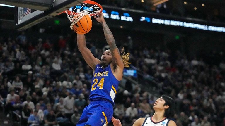 McNeese State forward Christian Shumate (24) dunks against Gonzaga forward...
