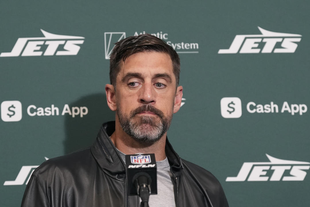New York Jets quarterback Aaron Rodgers pauses before answering a question during a press conference after an NFL football game against the Arizona Cardinals Sunday, Nov. 10, 2024, in Glendale, Ariz. The Cardinals won 31-6. (AP Photo/Ross D. Franklin)