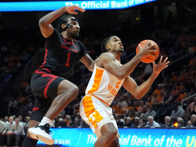 Tennessee guard Chaz Lanier (2) goes to the basket while defended by Gardner-Webb guard Anthony Selden (1) during an NCAA college basketball game on Monday, Nov. 4, 2024, in Knoxville, Tenn.