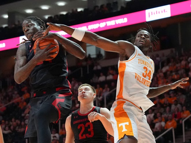 Gardner-Webb forward Isaiah Richards (24) gets the rebound over Tennessee forward Felix Okpara (34) during an NCAA college basketball game on Monday, Nov. 4, 2024, in Knoxville, Tenn.