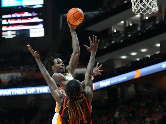 Tennessee forward Felix Okpara (34) with the shot attempt over Gardner-Webb forward Isaiah Richards (24) in an NCAA college basketball game on Monday, Nov. 4, 2024, in Knoxville, Tenn.