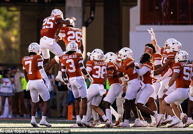 Texas Longhorns cornerback Jelani McDonald (25) celebrates an interception against the Kentucky Wildcats during the second quarter at Darrell K Royal-Texas Memorial Stadium Nov. 23