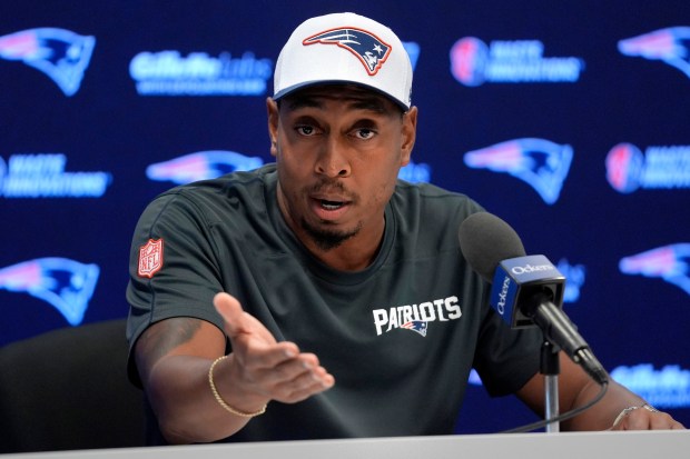 New England Patriots defensive coordinator DeMarcus Covington faces reporters before an NFL football practice, Thursday, Sept. 5, 2024, in Foxborough, Mass. (AP Photo/Steven Senne)
