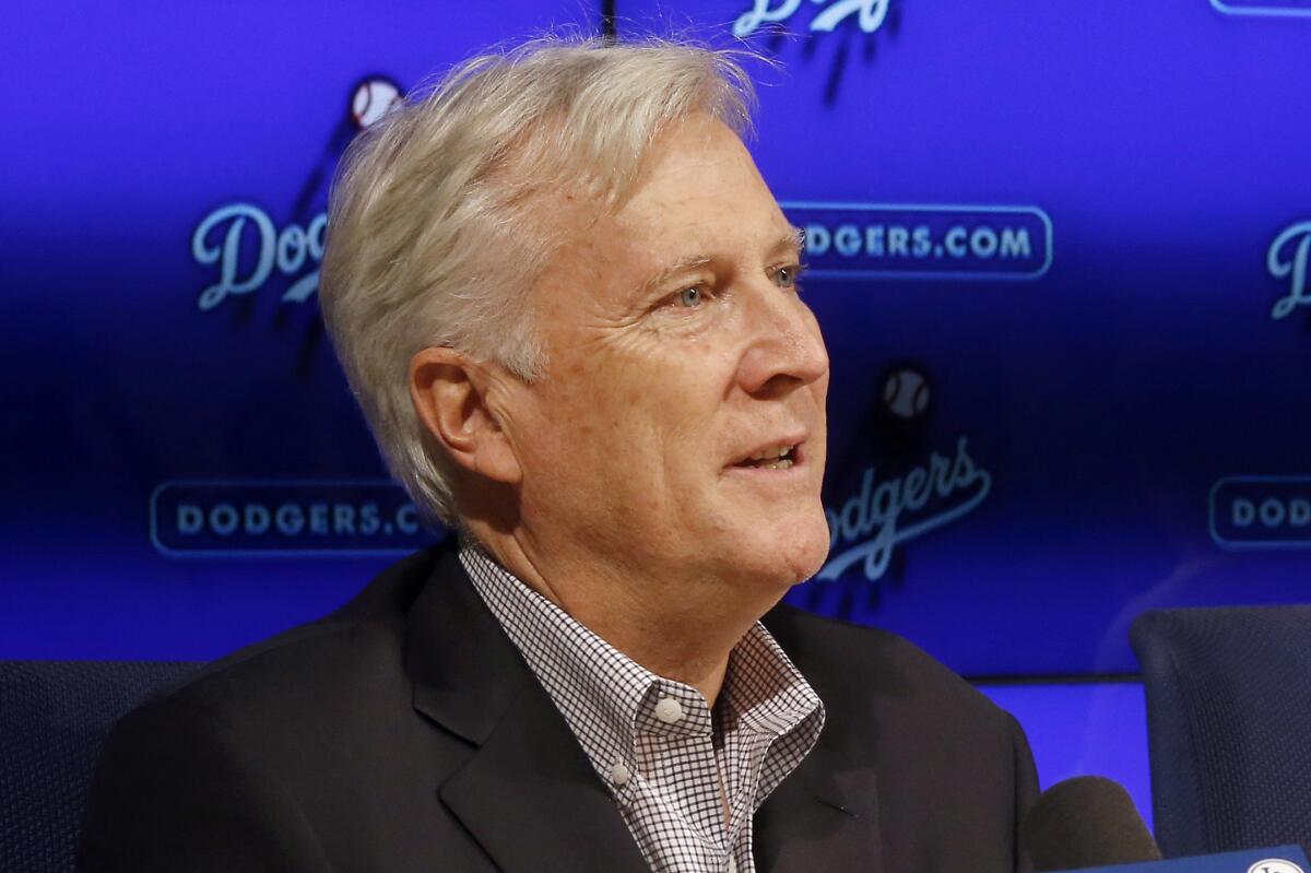 Dodgers owner Mark Walter speaks during a news conference.