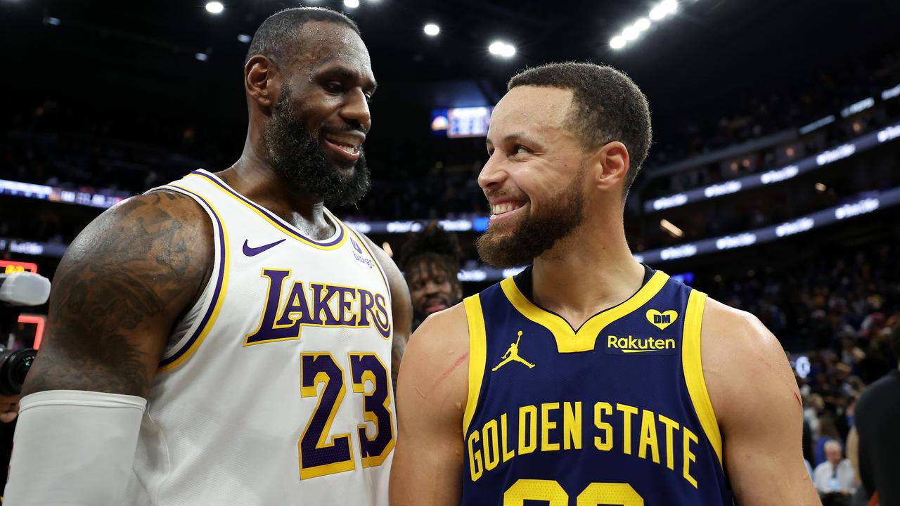 SAN FRANCISCO, CALIFORNIA - JANUARY 27: LeBron James #23 of the Los Angeles Lakers and Stephen Curry #30 of the Golden State Warriors talk to each other after the Lakers beat the Warriors in double overtime at Chase Center on January 27, 2024 in San Francisco, California. NOTE TO USER: User expressly acknowledges and agrees that, by downloading and or using this photograph, User is consenting to the terms and conditions of the Getty Images License Agreement. (Photo by Ezra Shaw/Getty Images)