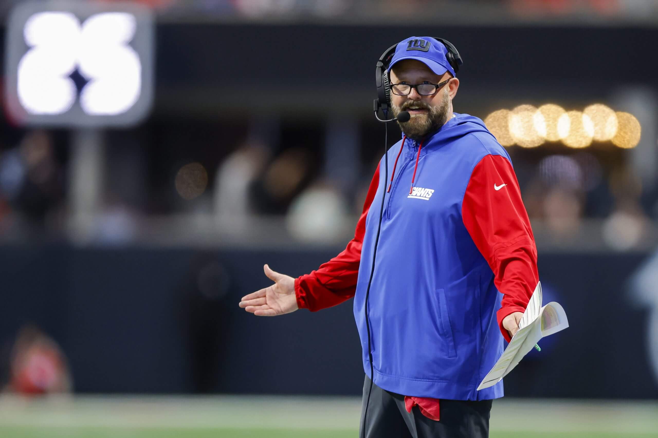 Head coach Brian Daboll of the New York Giants reacts during the fourth quarter against the Atlanta Falcons at Mercedes-Benz Stadium on December 22, 2024 in Atlanta, Georgia.