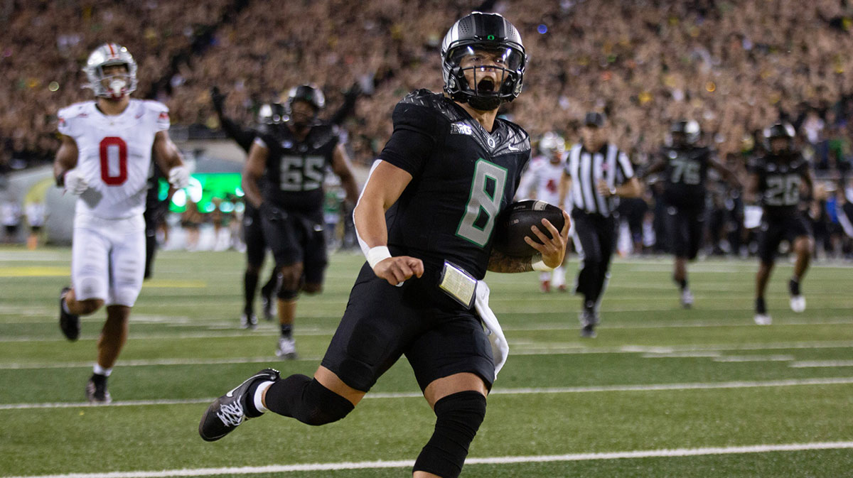 Oregon quarterback Dillon Gabriel scores a touchdown against Ohio State during the fourth quarter at Autzen Stadium Saturday, Oct. 12, 2024. 