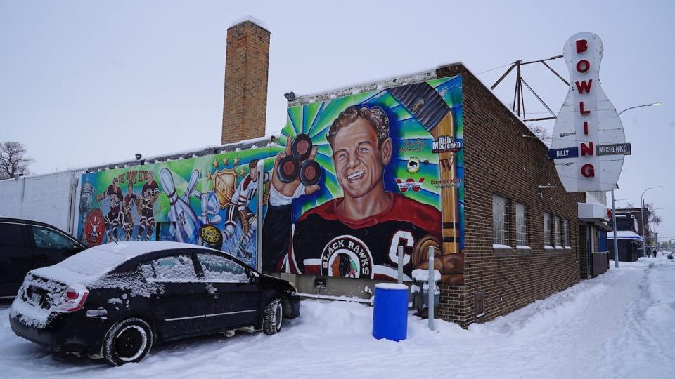 A mural of Bill Mosienko, painted by granddaughter-in-law Jen Mosienko, went up on the side of the bowling alley in 2016. 