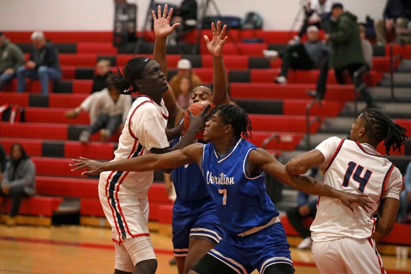 Central Lakes College's Makieth Deng looks to shoot the ball against Vermilion on Wednesday, Jan. 15, 2025, at Brainerd.