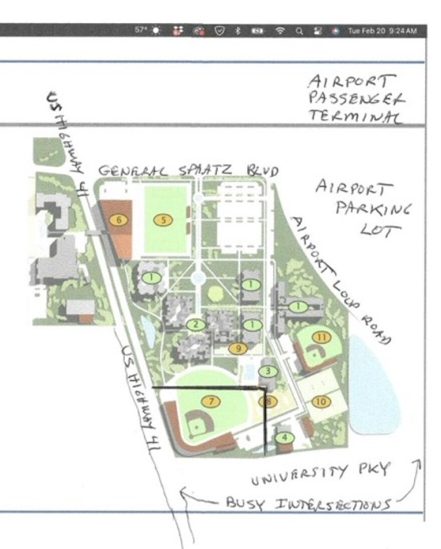 An image shows aerial view of a ballpark that does not fit in a black rectangle drawn to represent the actual land space