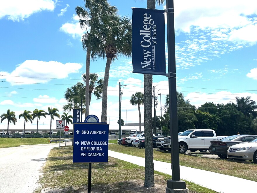 Signs at the Sarasota airport show straight ahead arrows for the airport and right for New College of Florida Pei campus.