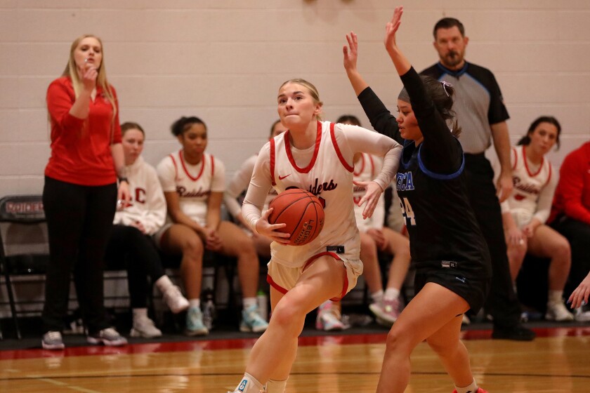 Central Lakes College's Cate Travis pushes to the basket against Itasca on Wednesday, Jan. 22, 205, in Brainerd.