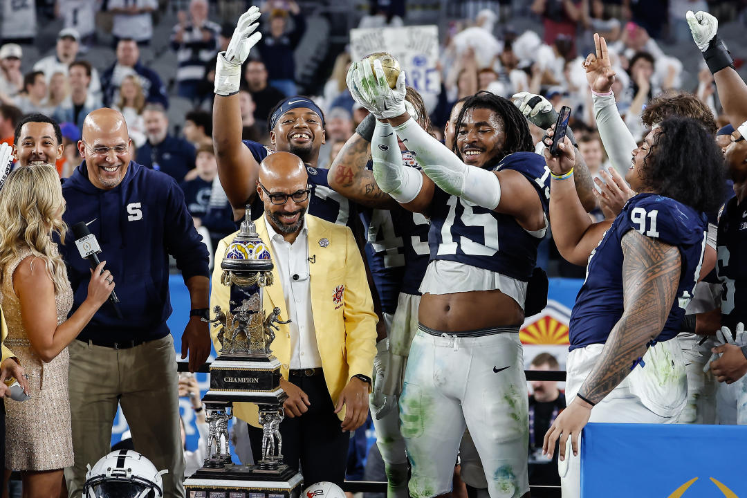 GLENDALE, AZ - DECEMBER 31:  Defensive End Amin Vanover #15 of the Penn State Nittany Lions holds the Fiesta Bowl trophy after the Penn State Nittany Lions versus Boise State Broncos College Football Playoff Quarterfinal at the Vrbo Fiesta Bowl on December 31,2024, at State Farm Stadium in Glendale, AZ.  (Photo by Kevin Abele/Icon Sportswire via Getty Images)