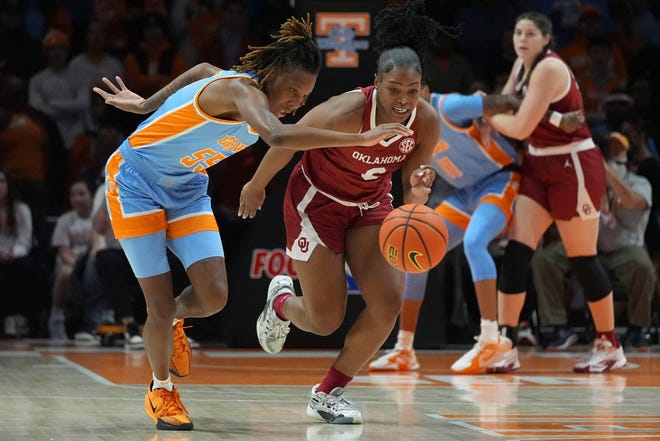 Tennessee's Talaysia Cooper (55) steals the ball from Oklahoma's Sahara Williams (6) during an NCAA college basketball game on Sunday, Jan. 5, 2025 in Knoxville, Tenn.