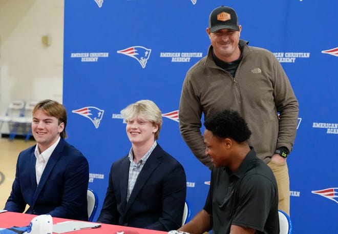 ACA baseball coach Del Howell talks to three of his players who signed to play baseball at the college level at ACA Tuesday, Jan. 9, 2025. Eric Hines signed with Alabama, Cade Durrett signed at Bevill State, and Eric Lightsey singed at Nortwest Mississippi.