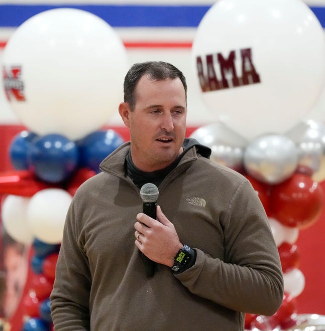 ACA baseball coach Del Howell talks to three of his players who signed to play baseball at the college level at ACA Tuesday, Jan. 9, 2025. Eric Hines signed with Alabama, Cade Durrett signed at Bevill State, and Eric Lightsey singed at Nortwest Mississippi.