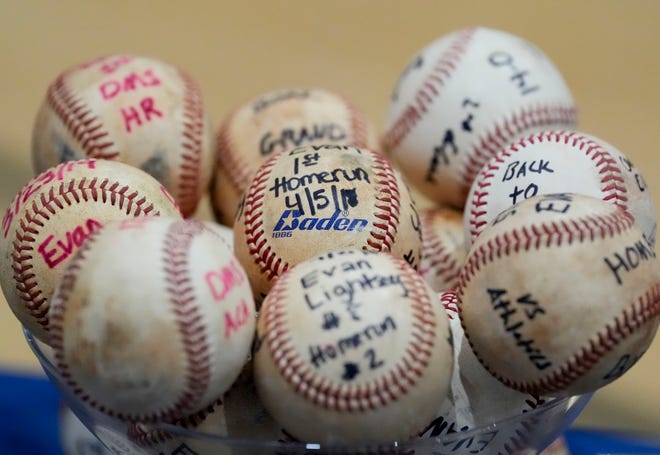 A collection of baseballs grace Evan Lightsey’s dispaly at ACA. He signed to play baseball at Northwest Mississippi at ACA Tuesday, Jan. 9, 2025.