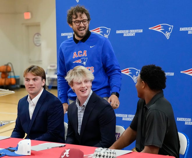 Austin Grammer talks to three players who signed to play baseball at the college level at ACA Tuesday, Jan. 9, 2025. Eric Hines signed with Alabama, Cade Durrett signed at Bevill State, and Eric Lightsey singed at Nortwest Mississippi.