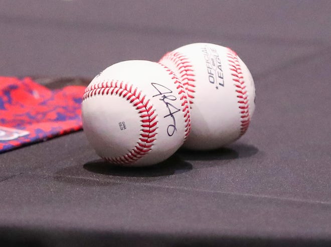 Josh Jung of the Texas Rangers signs autographs during a meet and greet during the College Baseball Foundation's First Pitch Luncheon, Thursday, Jan. 23, 2025, at the Lubbock Civic Center.