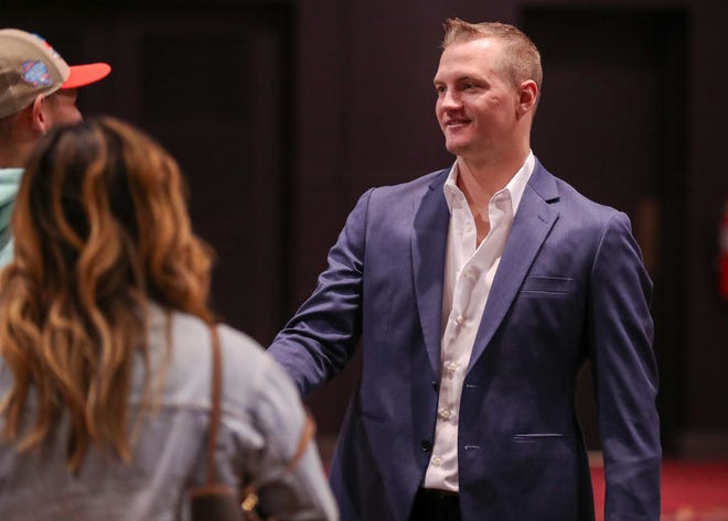 Josh Jung of the Texas Rangers signs autographs during a meet and greet during the College Baseball Foundation's First Pitch Luncheon, Thursday, Jan. 23, 2025, at the Lubbock Civic Center.