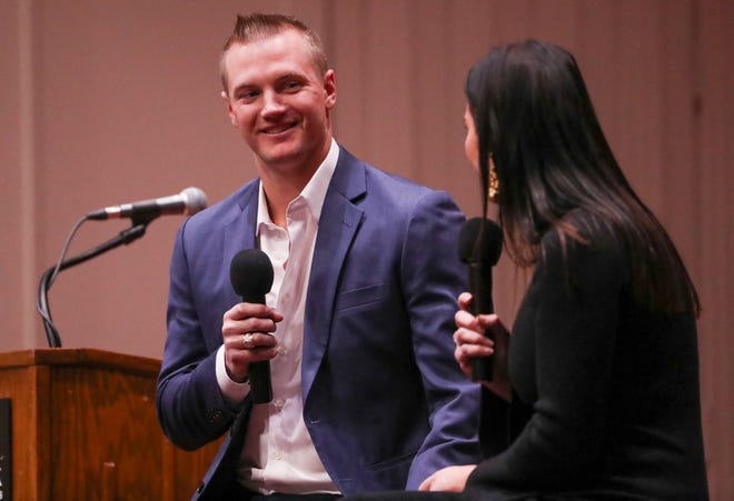 Josh Jung of the Texas Rangers is interviewed by sideline reporter Emily Jones during the College Baseball Foundation's First Pitch Luncheon, Thursday, Jan. 23, 2025, at the Lubbock Civic Center.