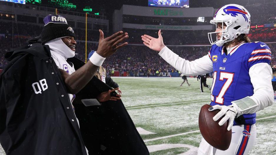 Lamar Jackson shakes hands with Josh Allen