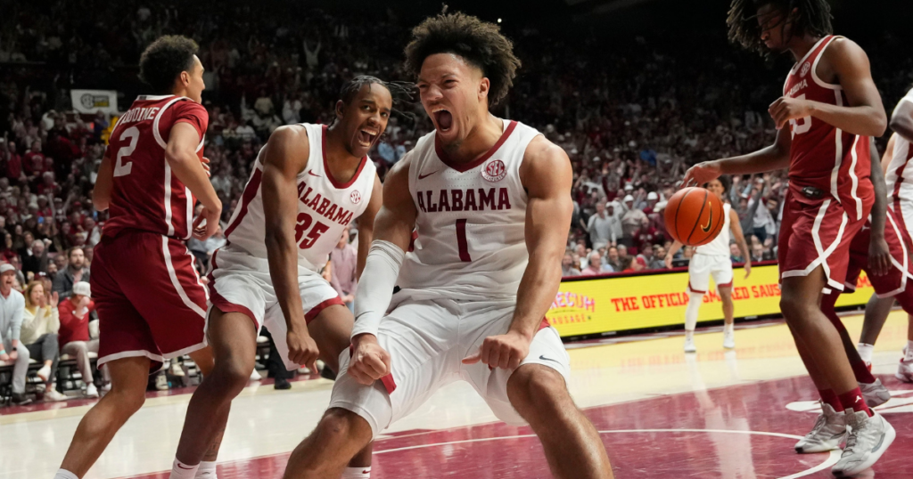 Jan 4, 2025; Tuscaloosa, AL, USA; Alabama forward Derrion Reid (35) and Alabama guard Mark Sears (1) react after Reid dunked on an alley oop pass from Sears at Coleman Coliseum. Alabama defeated Oklahoma 107-79. Mandatory Credit: Gary Cosby Jr.-Tuscaloosa News