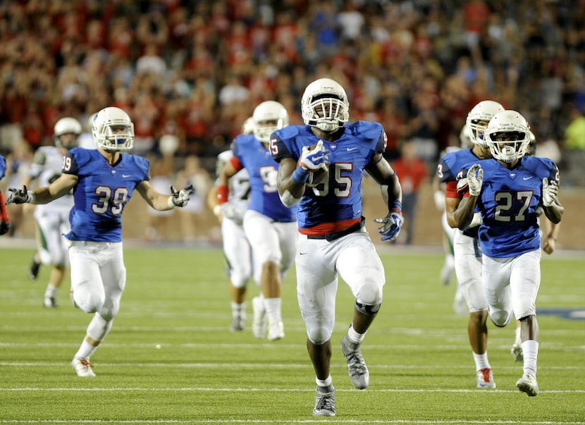 Allen's Levi Onwuzurike (95) returns a blocked extra point for a 2 points in the second...