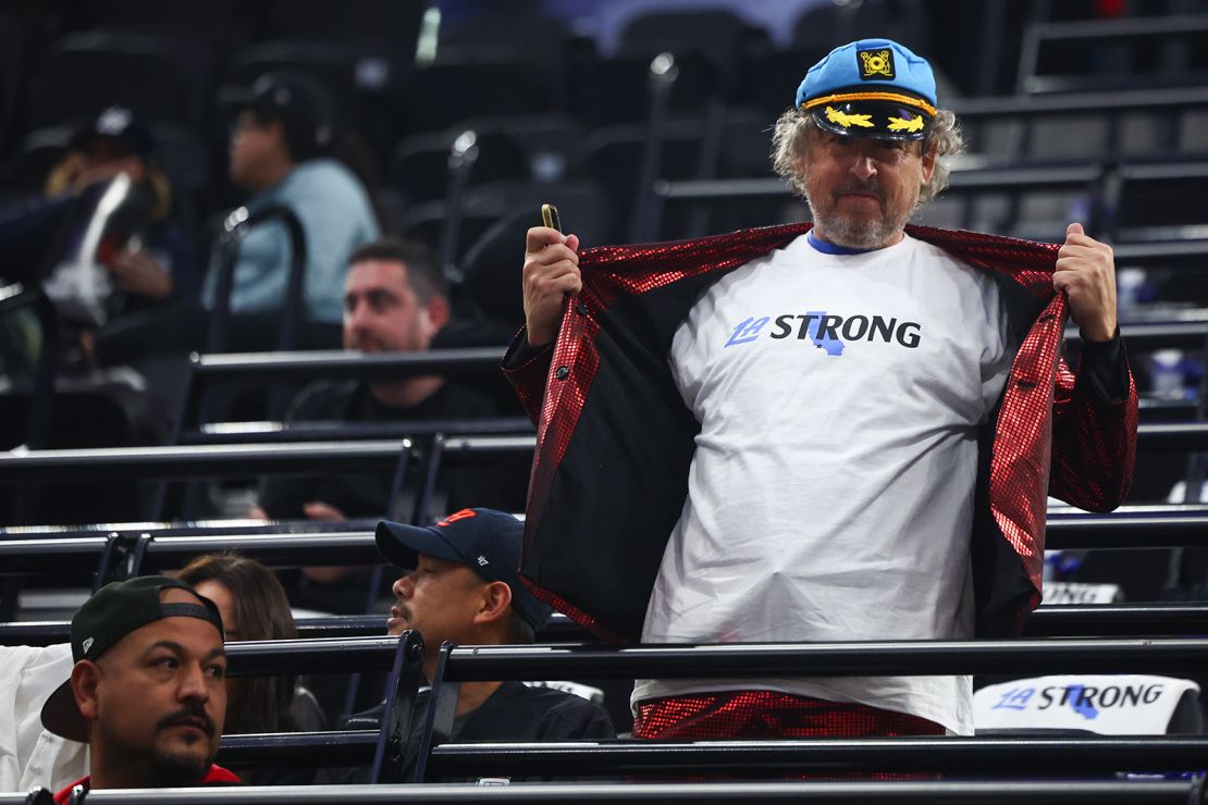 A Los Angeles Clippers fan poses in an