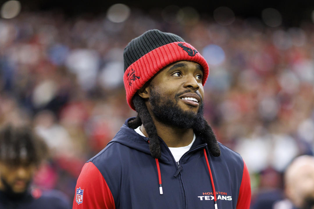 HOUSTON, TEXAS - DECEMBER 25: Wide receiver Diontae Johnson #18 of the Houston Texans stands on the sidelines during the national anthem prior to an NFL football game against the Baltimore Ravens, at NRG Stadium on December 25, 2024 in Houston, Texas. (Photo by Brooke Sutton/Getty Images)