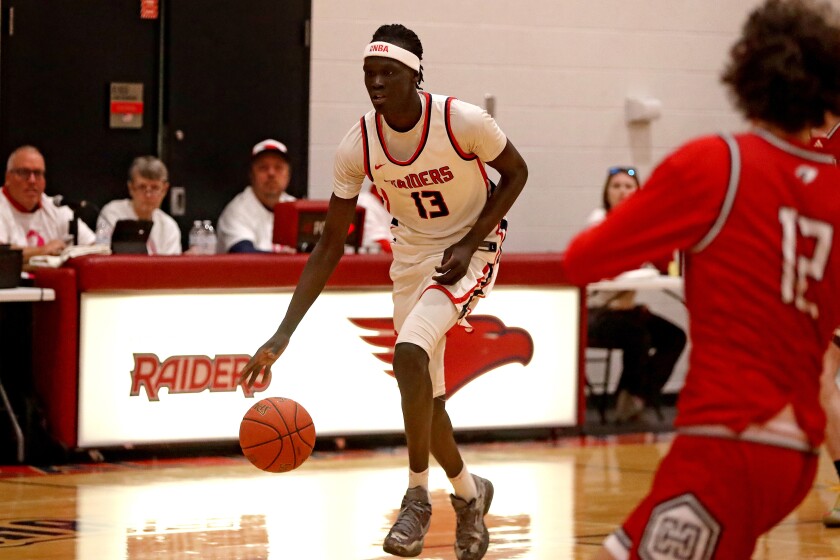 Central Lakes College's Makieth Deng takes the ball up the court against Hibbing on Wednesday, Feb. 5, 2025, in Brainerd.