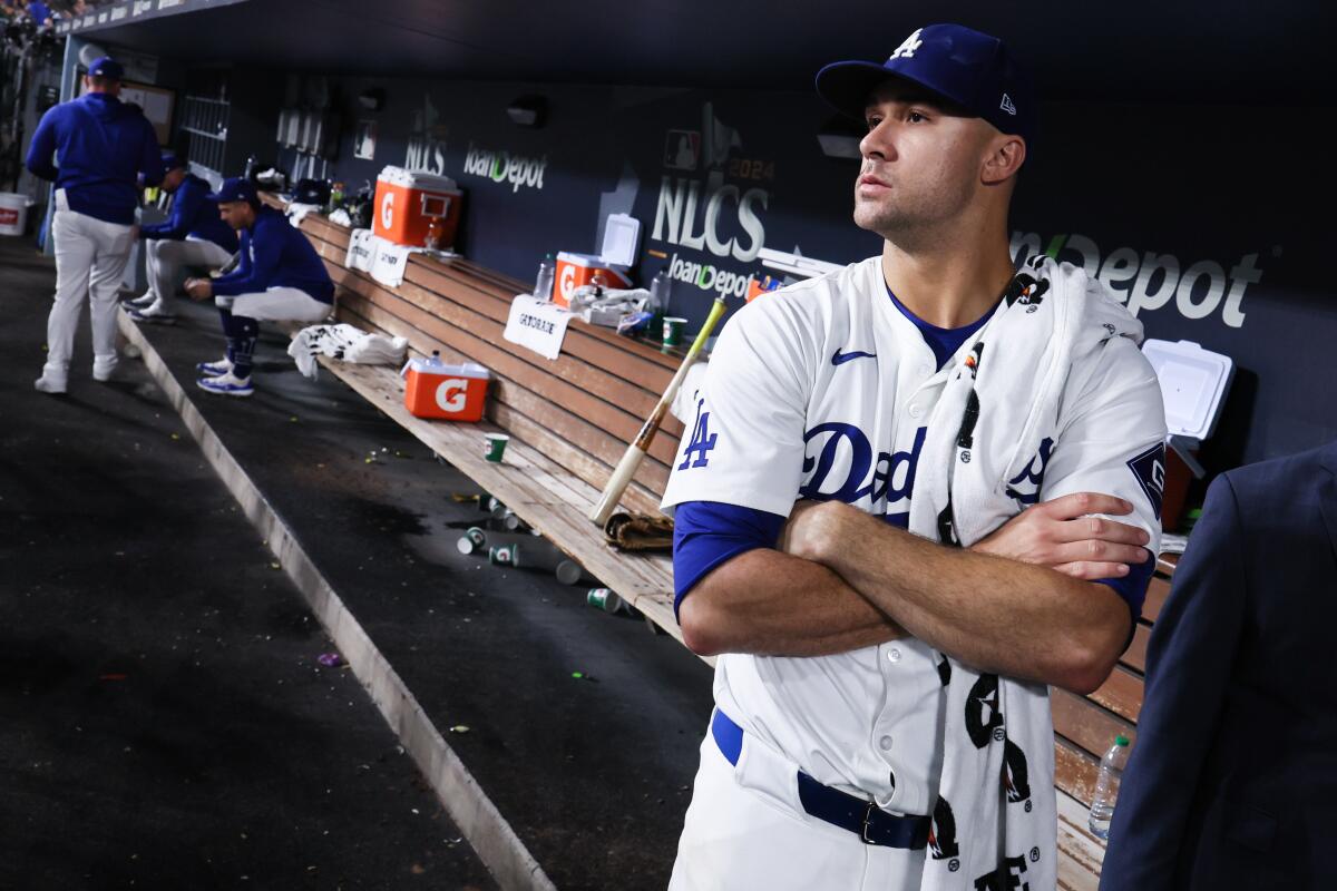 Dodgers starting pitcher Jack Flaherty watches from the Dodger Stadium dugout during Game 1 of the NLCS.