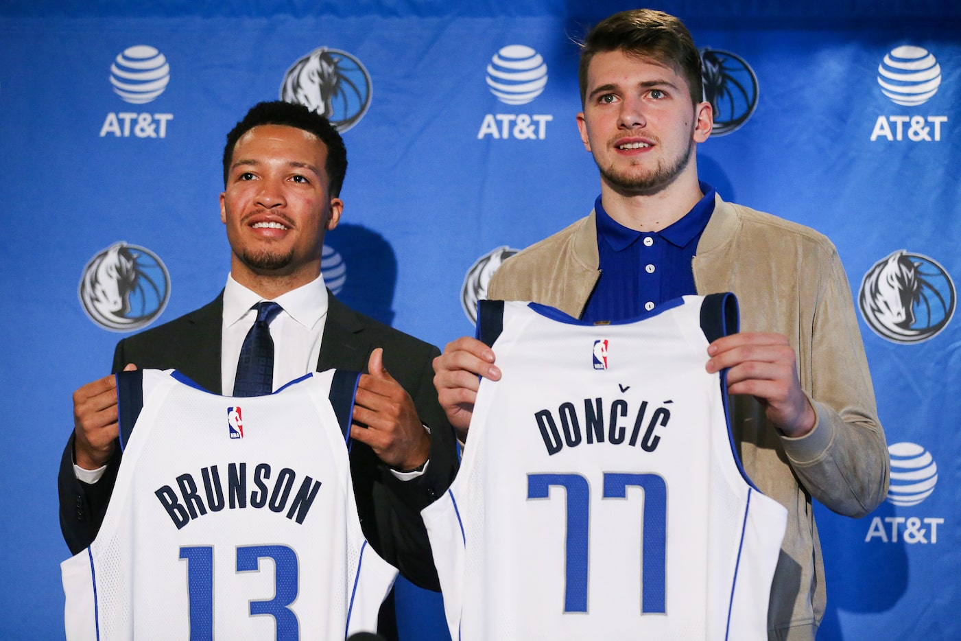 Dallas Mavericks draft picks Jalen Brunson (left) and Luka Doncic are introduced at the...