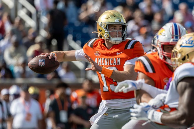 American team quarterback Riley Leonard of Notre Dame (13) throws the ball against the National team during the first half at Hancock Whitney Stadium.