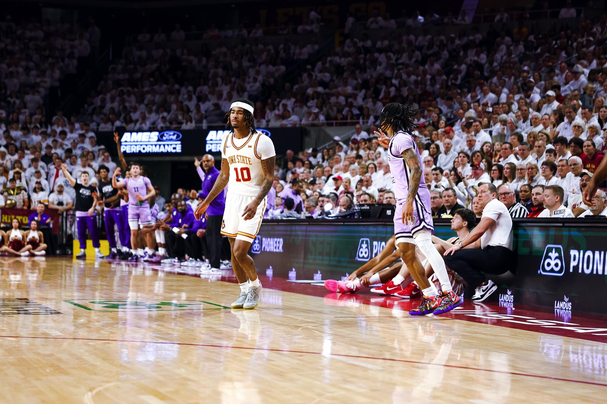 Kansas State's Dug McDaniel drills a three. 