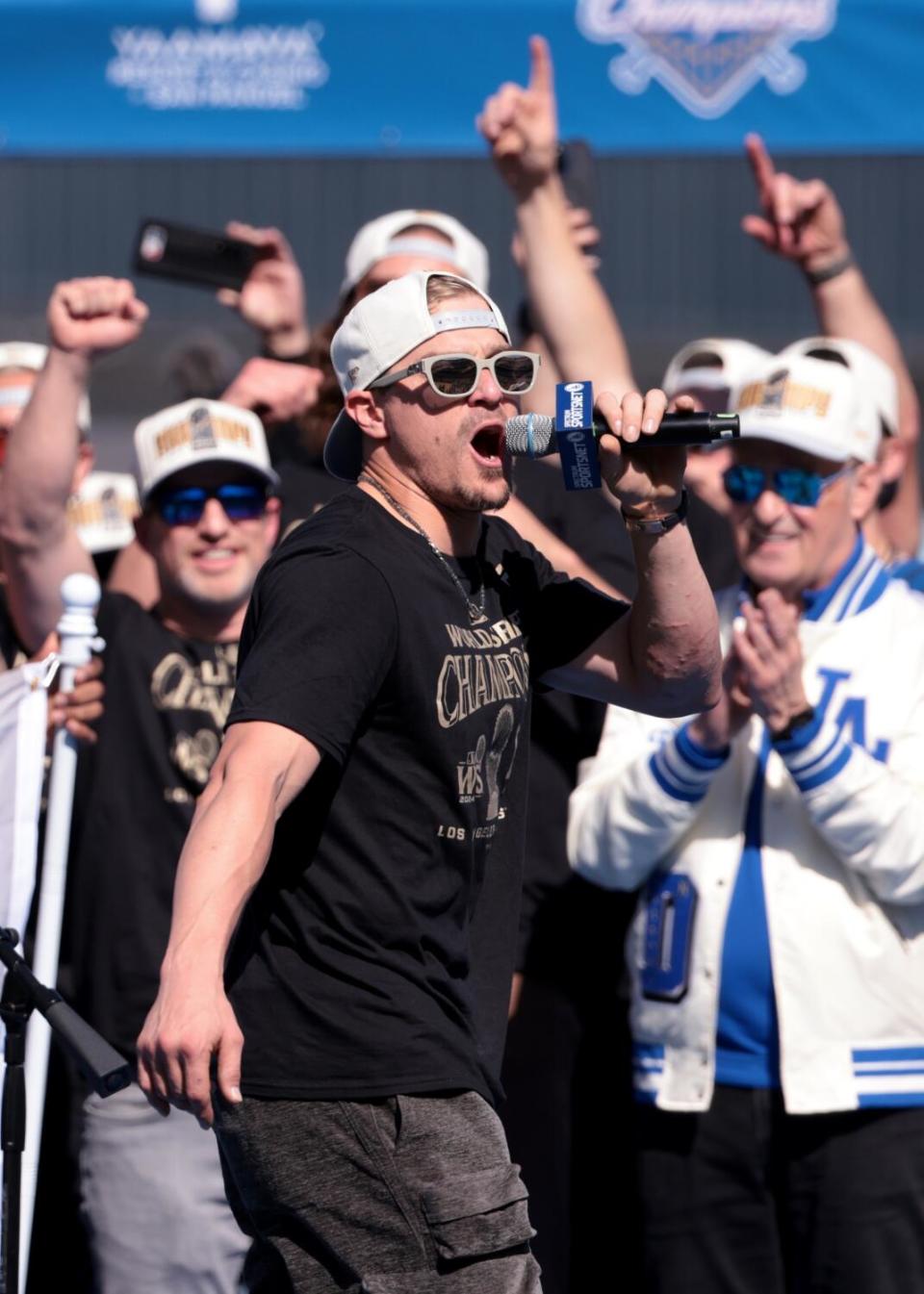 Kiké Hernández speaks at the Dodgers' World Series celebration at Dodger Stadium on November 1.