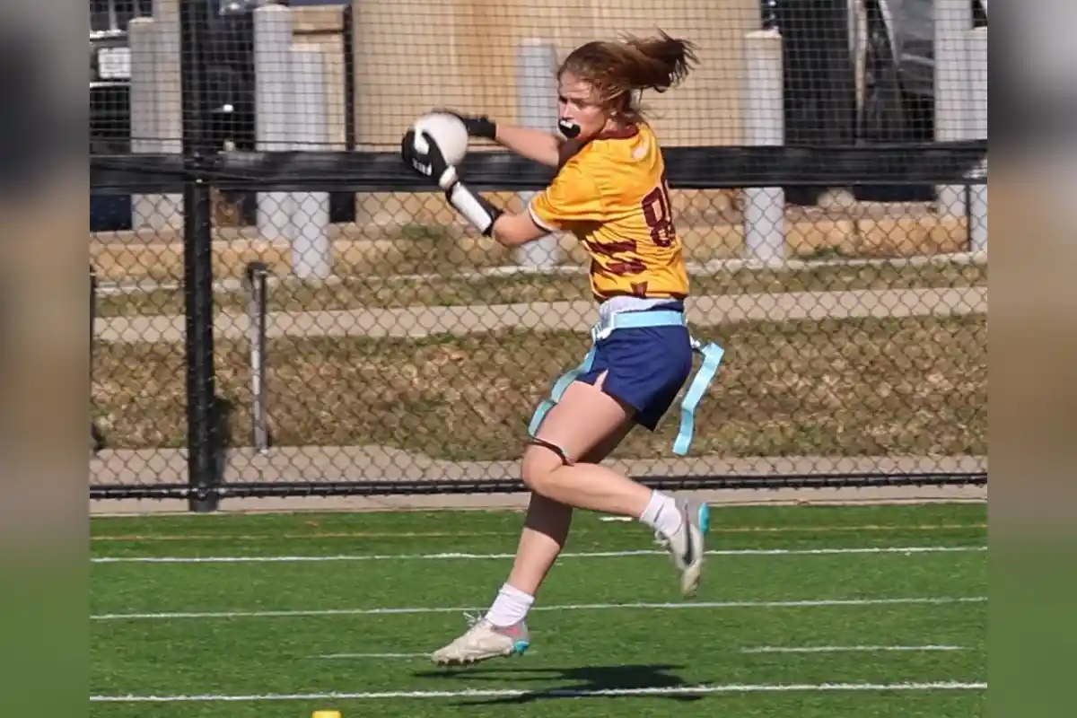 Josie Clayton catching a pass during game of flag football