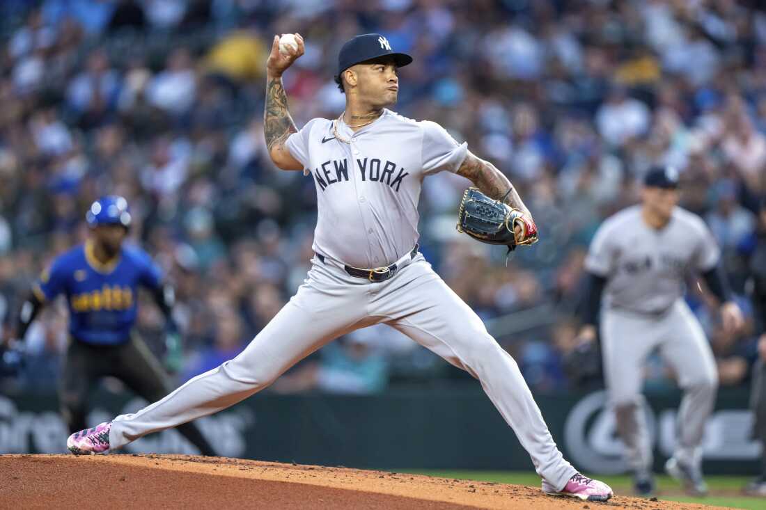 New York Yankees starter Luis Gil delivers a pitch during a baseball game against the Seattle Mariners, Sept. 17, 2024, in Seattle.