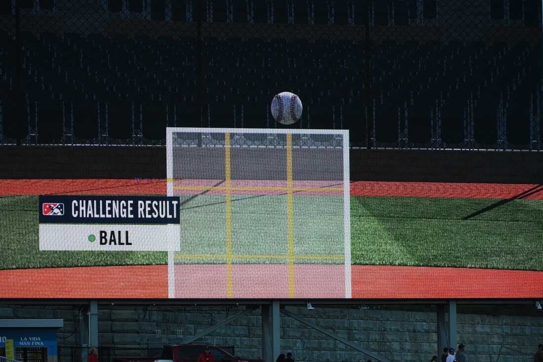 A view of a replay on the videoboard of an Automated Ball-Strike system challenge during a 