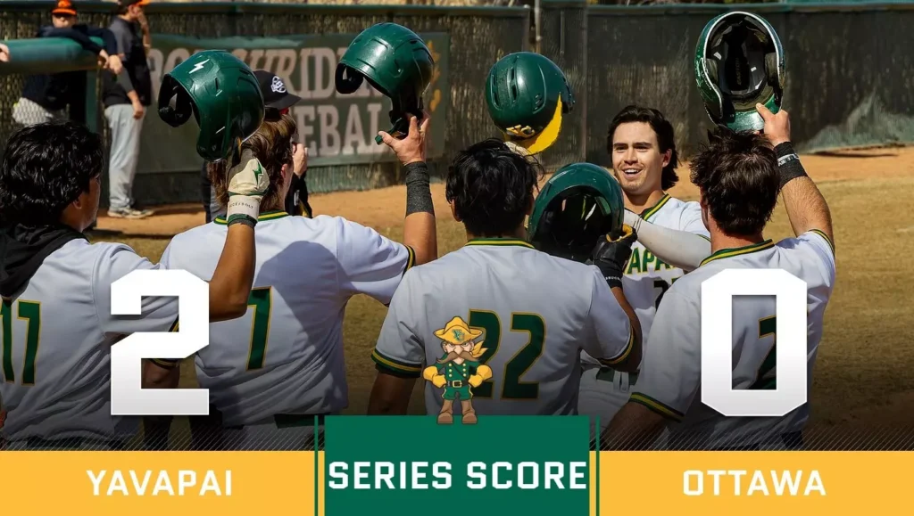 Yavapai College baseball players celebrating after winning a game.